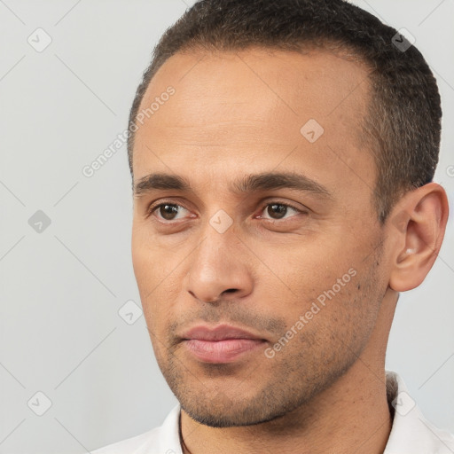 Neutral white young-adult male with short  brown hair and brown eyes