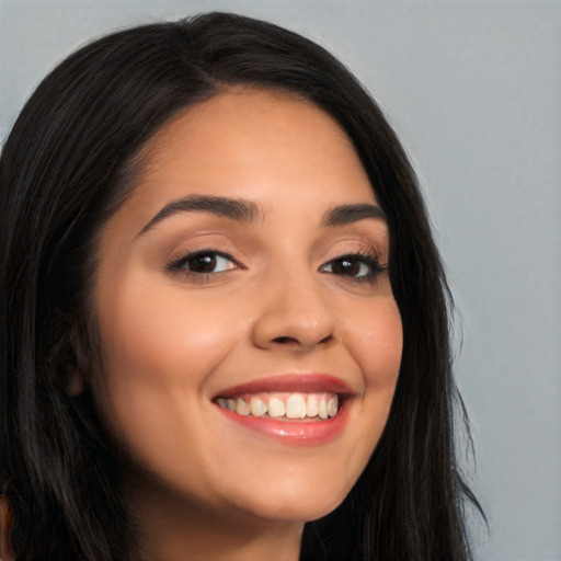 Joyful white young-adult female with long  black hair and brown eyes