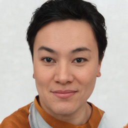 Joyful asian young-adult female with short  brown hair and brown eyes