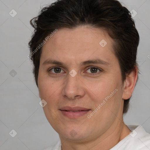 Joyful white adult female with short  brown hair and brown eyes