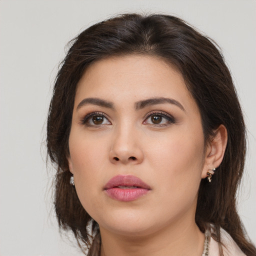 Neutral asian young-adult female with long  brown hair and brown eyes