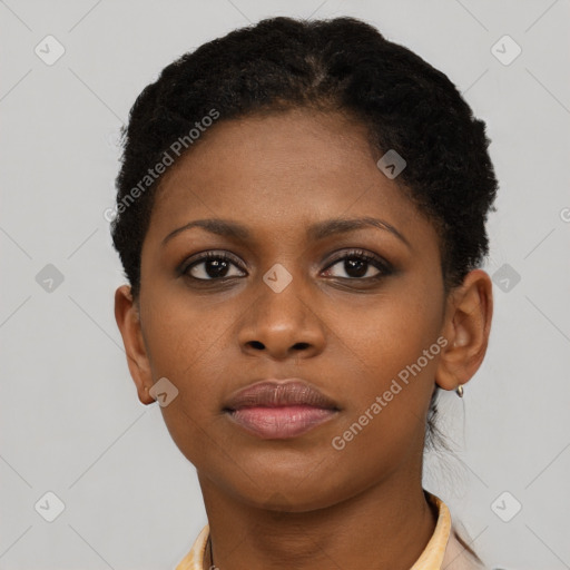 Neutral black young-adult female with short  brown hair and brown eyes