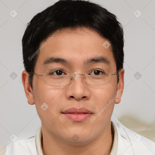 Joyful asian young-adult male with short  brown hair and brown eyes