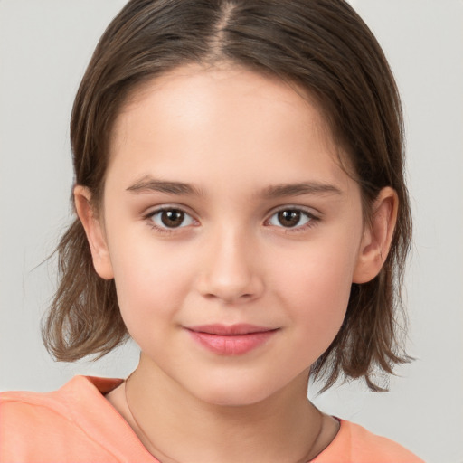 Joyful white child female with medium  brown hair and brown eyes