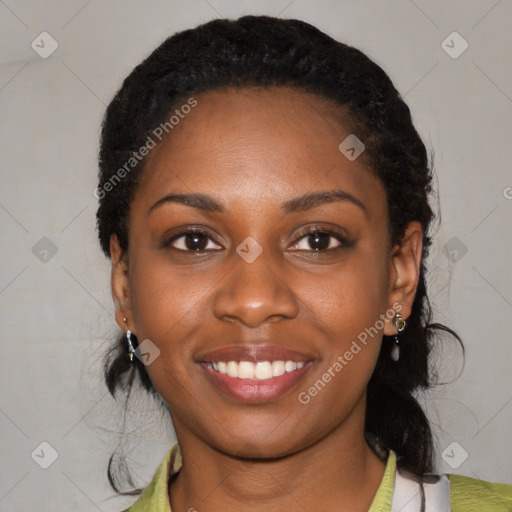 Joyful black young-adult female with medium  black hair and brown eyes