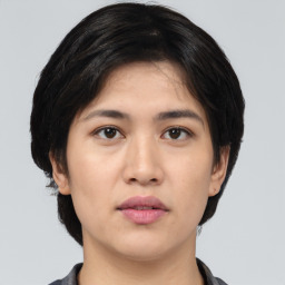 Neutral asian young-adult female with medium  black hair and brown eyes