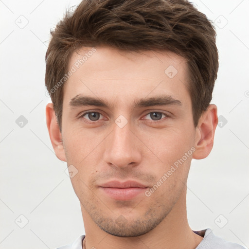 Neutral white young-adult male with short  brown hair and grey eyes