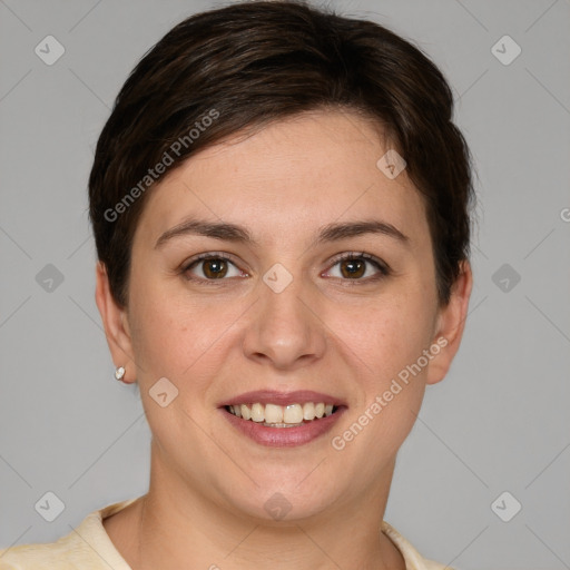 Joyful white young-adult female with short  brown hair and grey eyes