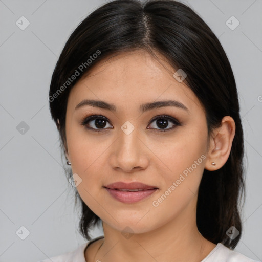 Joyful latino young-adult female with medium  black hair and brown eyes