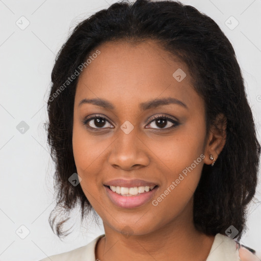 Joyful black young-adult female with medium  brown hair and brown eyes