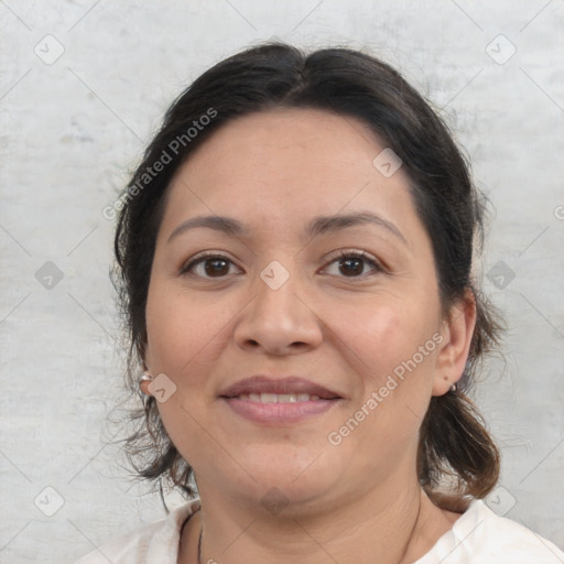 Joyful white adult female with medium  brown hair and brown eyes