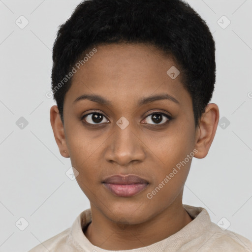 Joyful black young-adult female with short  black hair and brown eyes