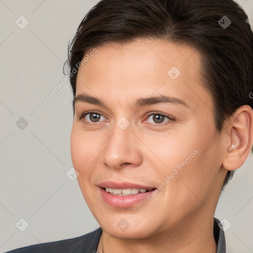 Joyful white young-adult female with short  brown hair and brown eyes