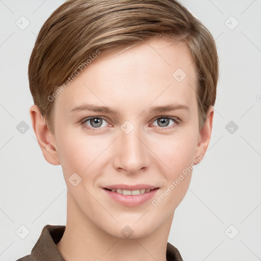 Joyful white young-adult female with short  brown hair and grey eyes