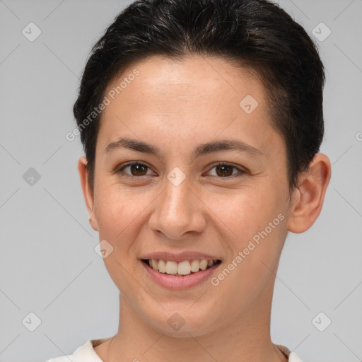 Joyful white young-adult female with short  brown hair and brown eyes