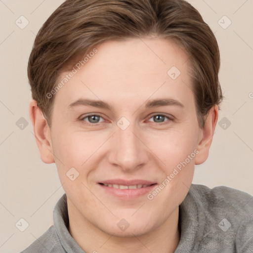 Joyful white young-adult female with short  brown hair and grey eyes