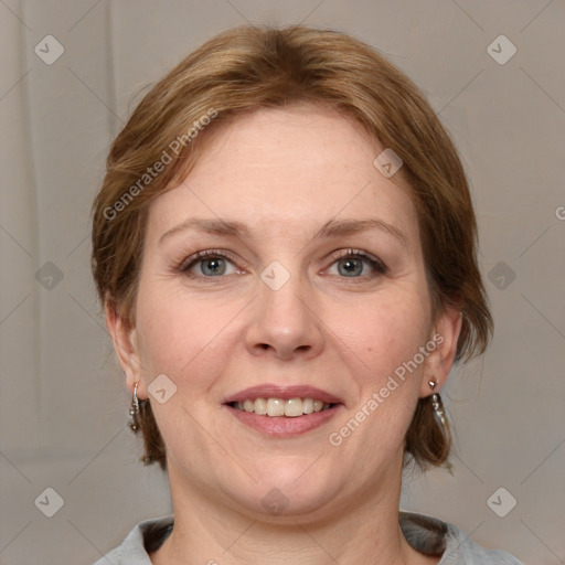 Joyful white adult female with medium  brown hair and grey eyes