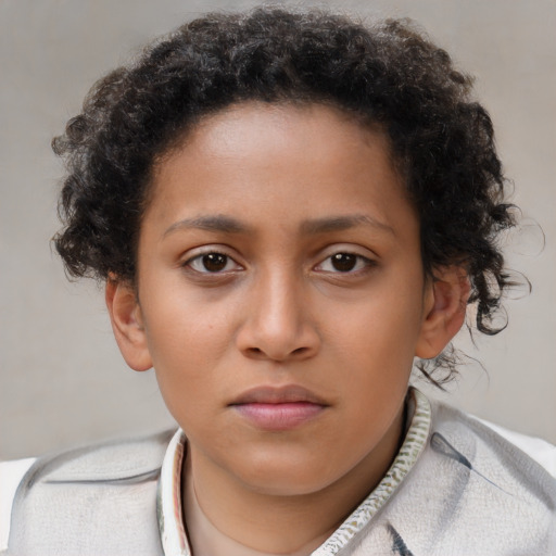 Neutral black child female with short  brown hair and brown eyes