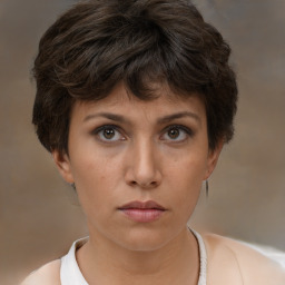 Neutral white young-adult female with short  brown hair and brown eyes