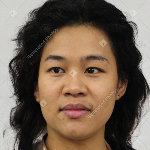 Joyful asian young-adult female with medium  black hair and brown eyes