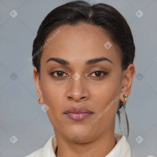 Joyful latino young-adult female with short  brown hair and brown eyes