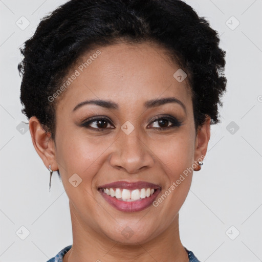 Joyful latino young-adult female with short  brown hair and brown eyes