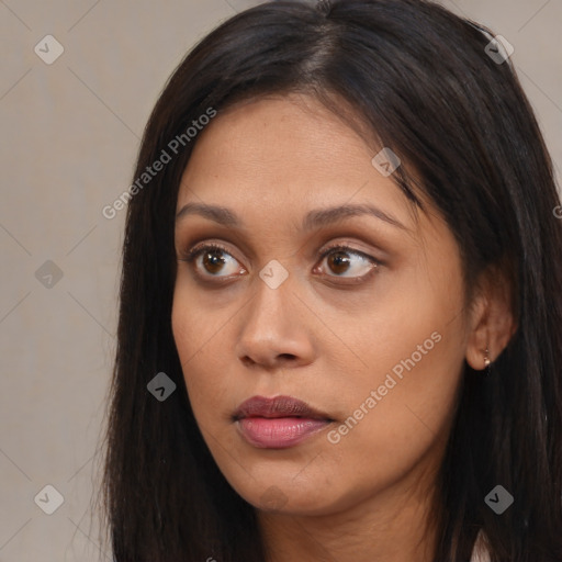 Joyful asian young-adult female with long  brown hair and brown eyes