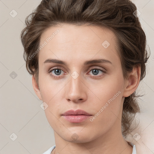 Neutral white young-adult female with medium  brown hair and grey eyes