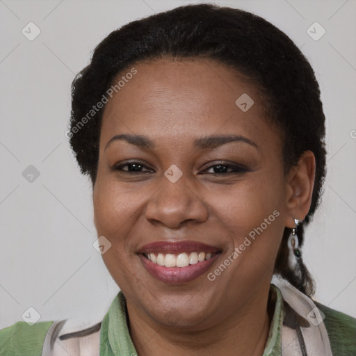 Joyful latino adult female with short  brown hair and brown eyes