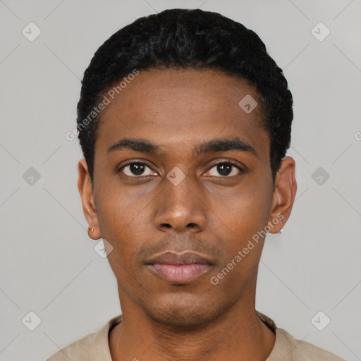 Neutral black young-adult male with short  black hair and brown eyes