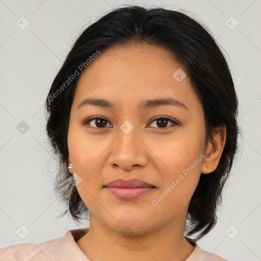 Joyful asian young-adult female with medium  brown hair and brown eyes