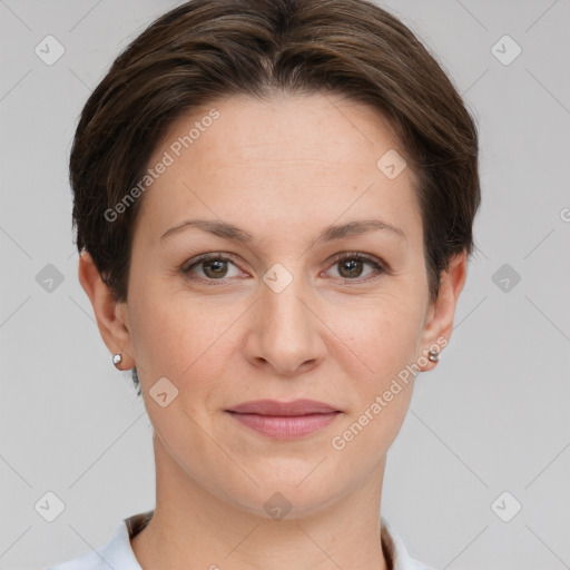 Joyful white young-adult female with short  brown hair and grey eyes