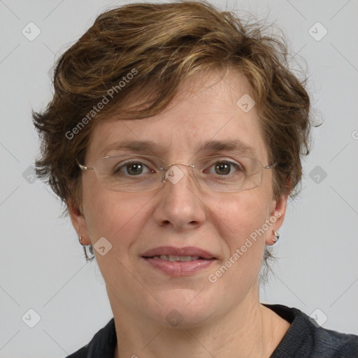 Joyful white adult female with medium  brown hair and blue eyes