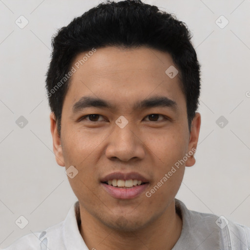 Joyful asian young-adult male with short  black hair and brown eyes