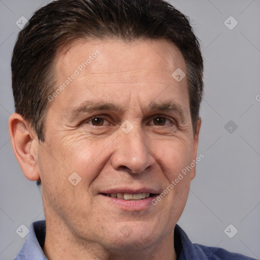 Joyful white middle-aged male with short  brown hair and brown eyes