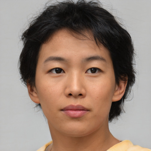 Neutral asian young-adult female with medium  brown hair and brown eyes