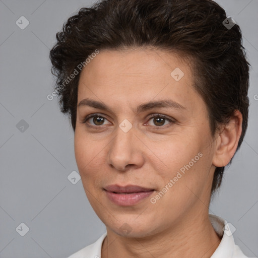 Joyful white adult female with short  brown hair and brown eyes