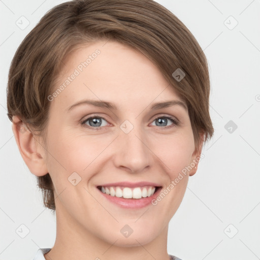 Joyful white young-adult female with short  brown hair and grey eyes