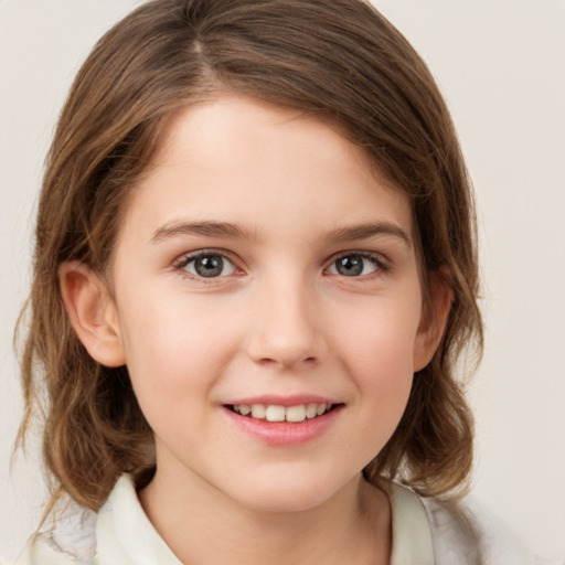 Joyful white child female with medium  brown hair and brown eyes