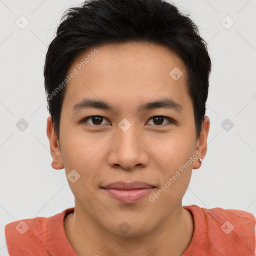 Joyful asian young-adult male with short  brown hair and brown eyes