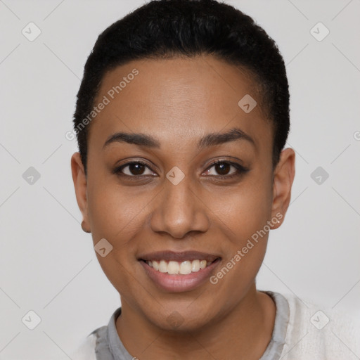 Joyful latino young-adult female with short  black hair and brown eyes