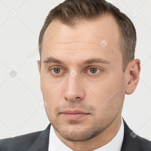 Neutral white young-adult male with short  brown hair and brown eyes