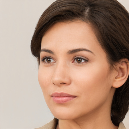 Neutral white young-adult female with medium  brown hair and brown eyes