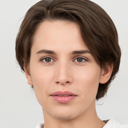 Neutral white young-adult female with short  brown hair and brown eyes