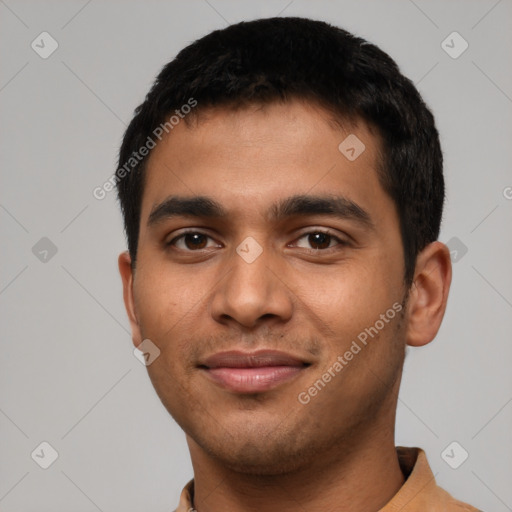 Joyful latino young-adult male with short  black hair and brown eyes