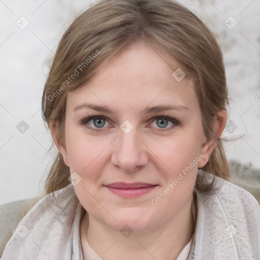 Joyful white young-adult female with medium  brown hair and blue eyes