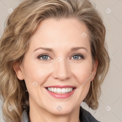 Joyful white young-adult female with medium  brown hair and blue eyes