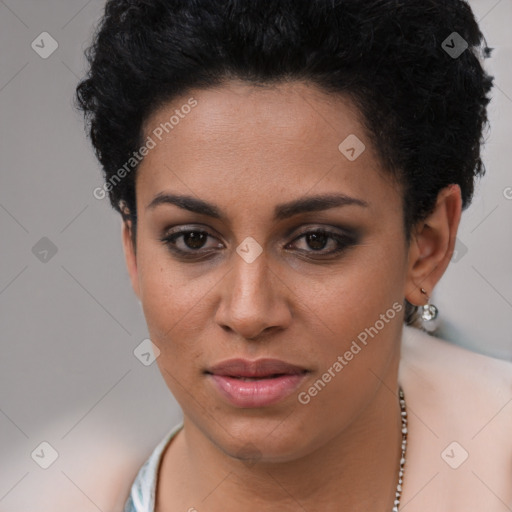 Joyful latino young-adult female with short  brown hair and brown eyes