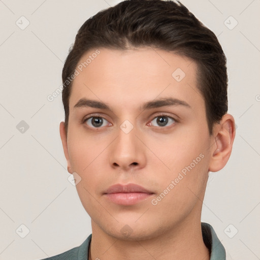 Neutral white young-adult male with short  brown hair and brown eyes