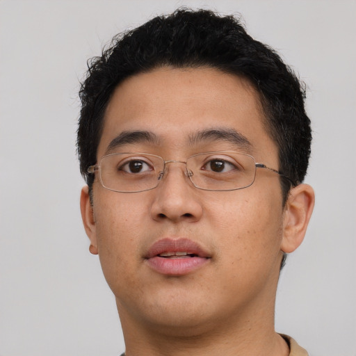 Neutral asian young-adult male with short  brown hair and brown eyes